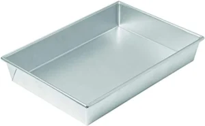 Chicago Metallic Commercial II Traditional Uncoated Bake N’ Roast Pan. Perfect for roasting chicken and vegetables, creating one-pan meals, and more. 13 by 9 by 2-1/4-Inch